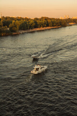 Boats float on the river