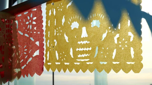 Colourful dia del muerte paper decoration 