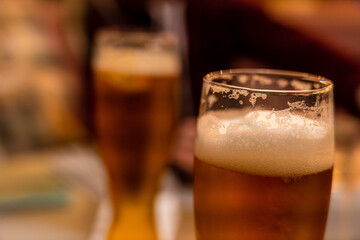 Fresh cold glass of light beer in restaurant