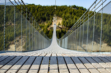 Fototapeta premium suspension bridge over the river