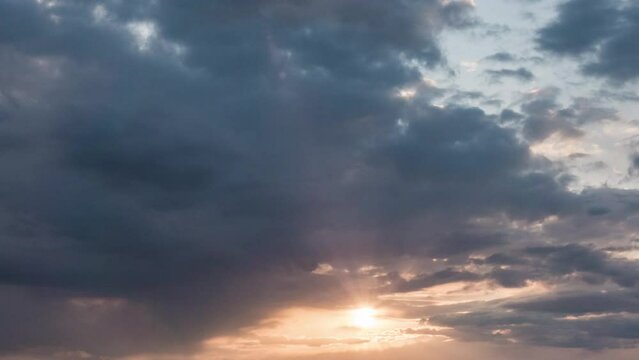 4K Time lapse of Majestic sunset or sunrise landscape Amazing light of nature cloudscape sky and Clouds moving away rolling colorful dark sunset clouds Footage timelapse.Nature environment background