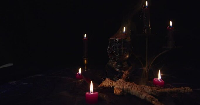 Altar for satanic rituals on a black background.