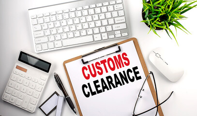 CUSTOMS CLEARANCE text on white paper. the inscription on the notebook