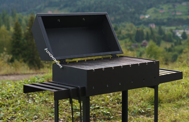 modern barbeque grill with mountain view
