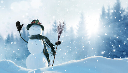 Merry Christmas and happy New Year greeting card with copy-space. Happy snowman with a broom in...