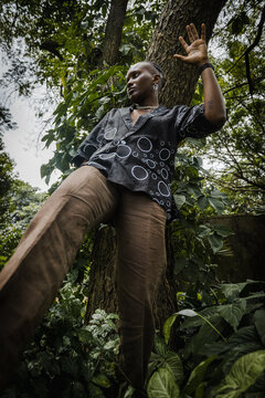 a black woman having fun in a garden