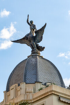 Sculpture of the Fenix Bird decorating the cupola of a building in Alicante, Spain