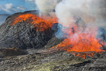 active volcano on Iceland. Eruption with lava flow from a volcanic crater on the Reykjanes...