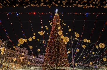 Rolgordijnen Christmas tree at the St.Sophia Square during celebration New Year holidays in Kyiv © Dmytro
