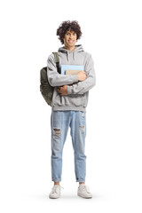 Naklejka premium Full length portrait of a male student with curly hair carrying a backpack and books