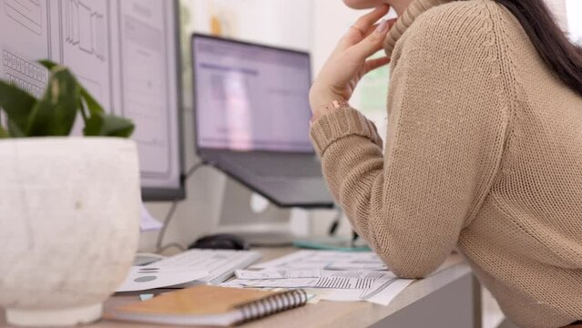 Web design, work and woman planning on a computer, working on the web and doing research with notes at work. Creative, innovation and hands of a worker in ux on internet for inspiration for a website