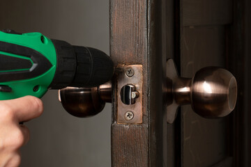 replacement, installation of a wooden door lock