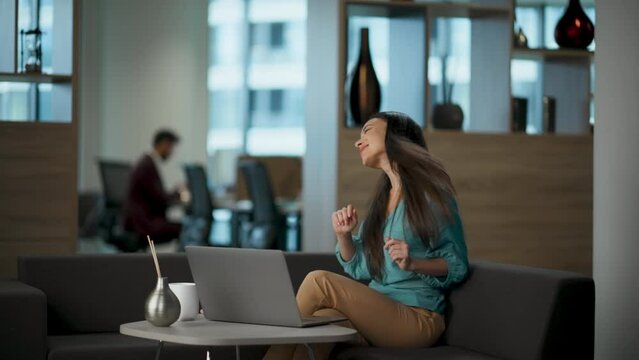Overjoyed worker dancing office closeup. Woman celebrating career promotion