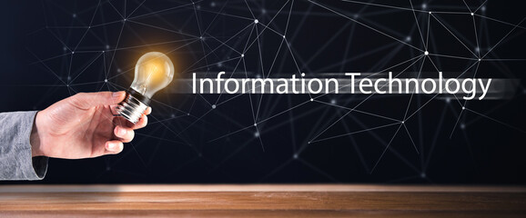 Fototapeta premium Information technology and light bulb in hand