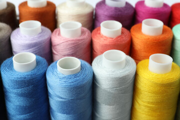 Set of different colorful sewing threads, closeup