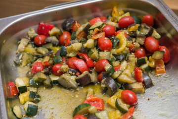 Warm cucumber and tomato salad in detail.