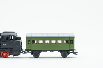 Partial view of vintage train toy on white background