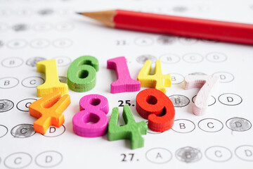 Math number with pencil on answer sheet test choice for learning Mathematic, education math concept.