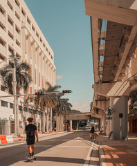 view of the city young man on skateboard Downtown Miami 