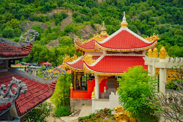 Naklejka premium Buddhist temple. Chua Teong Lam Lotion Pagoda is a Buddhist temple with a large concrete statue of Buddha Amitabha 44 m high, which is the largest in Vietnam. 