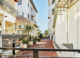 Nice Israeli courtyard with Mediterranean-style residential buildings