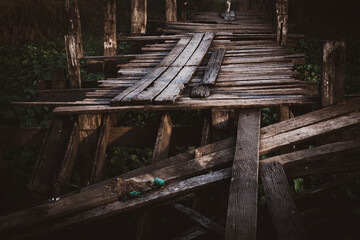 old broken bridge of planks 