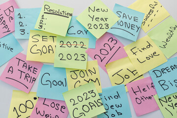 New year 2023 goals and resolutions written on a colorful sticky notes