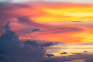 The dramatic colors of the sunset in the sky gradient from blue to orange.