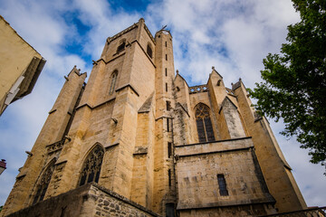 View on the gothic Saint Etienne collegiate church in the village of Capestang in the south of France (Herault)