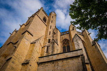 Fototapeta na wymiar View on the gothic Saint Etienne collegiate church in the village of Capestang in the south of France (Herault)