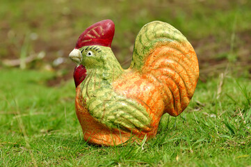 Chicken piggy bank made of clay selective focus