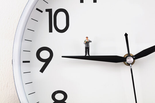 Miniature creative reading time on clock