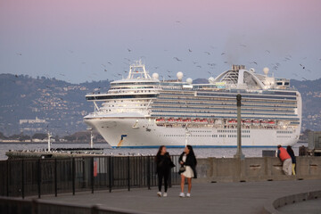 Princess cruiseship or cruise ship liner Ruby P in San Francisco port Bay terminal sail away...