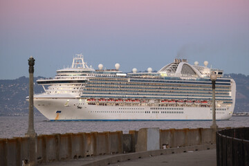 Princess cruiseship or cruise ship liner Ruby P in San Francisco port Bay terminal sail away...