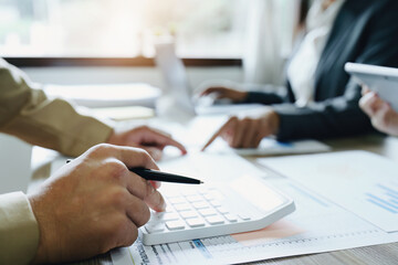 Asian entrepreneurs and business people meeting in a conference room in business planning, financial budget and investment risk assessment to analyze customer groups to increase company growth