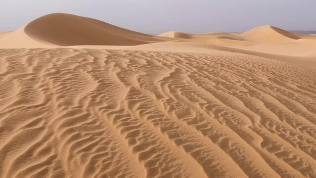 Sahara desert sand dunes landscapes, Mhamid, Erg Lihoudi, Morocco. Nature background 4k footage.
