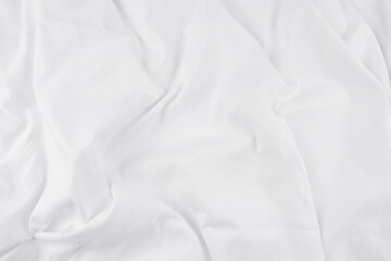 Obraz premium White fabric. luxurious white fabric texture background. Creases of satin, silk, and cotton.