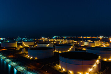 Aerial view oil tanker. Oil loading dock of business logistic sea going ship, Crude oil tanker lpg ngv at night. Group Oil tanker ship to Port of Singapore - Cargo ship import export