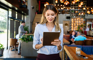 Portrait of happy beautiful successful business woman, manager working