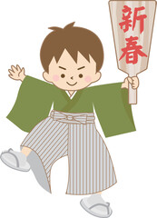 新春の羽子板を持つ袴姿の男の子
