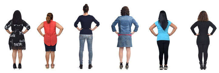 back view of a group of  women with arms akimbo on white background