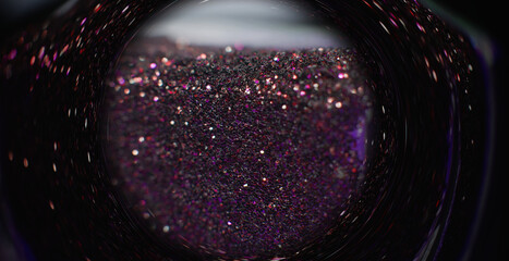 Glitter vortex. Blur sequin background. Fantasy hourglass. Pink red purple color bokeh glow...