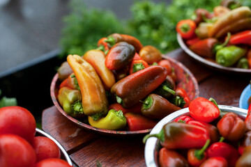 Sweet pepper, hot chili pepper. A vegetable counter at a street market.