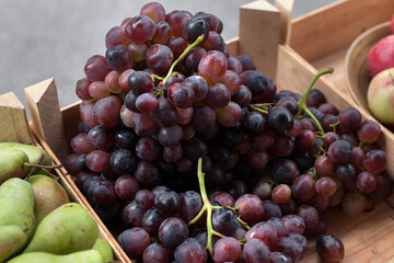 Grape. A vegetable counter at a street market. Trade in seasonal goods.