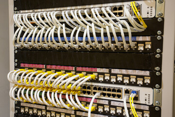 Close up. The front of the UTP LAN cable with sticker label connected line arrangement to Ethernet Switch that are installed