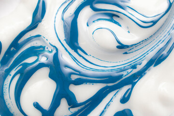 blue paint smears on white mass