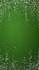 Falling snowflakes christmas background. Subtle flying snow flakes and stars on christmas green background. Beautifully falling snowflakes overlay. Vertical vector illustration.