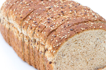 Close-up sliced ​​wholemeal bread, on white background
