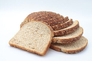 sliced ​​wholemeal bread, on white background. Concept of healthy food, balanced breakfasts, fiber foods.