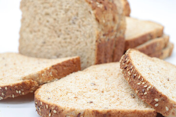 Close-up sliced ​​wholemeal bread, on white background
